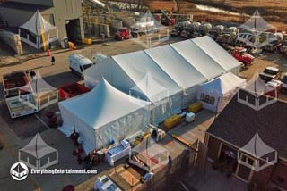 large tent rental setup on contruction site