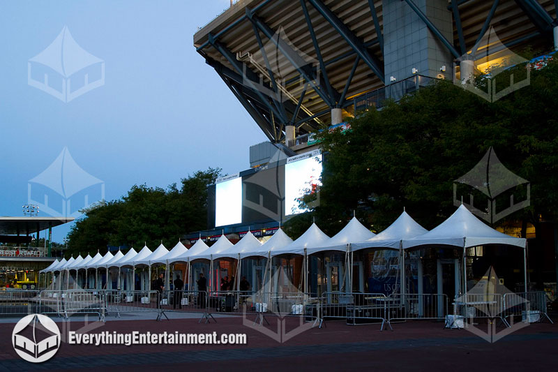 Multiple 10x10 high peak marquee tents in row setup in queens for event registration