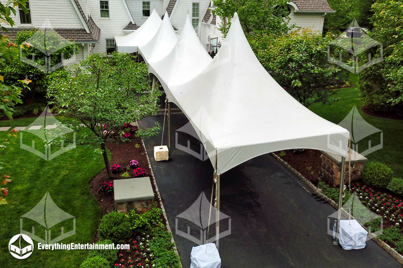 three 10x20 high peak tents setup in driveway