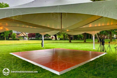 16x16-cherry-dance-floor A 16x16 Dance Floor underneath a 35x40 High Peak Hext Tent