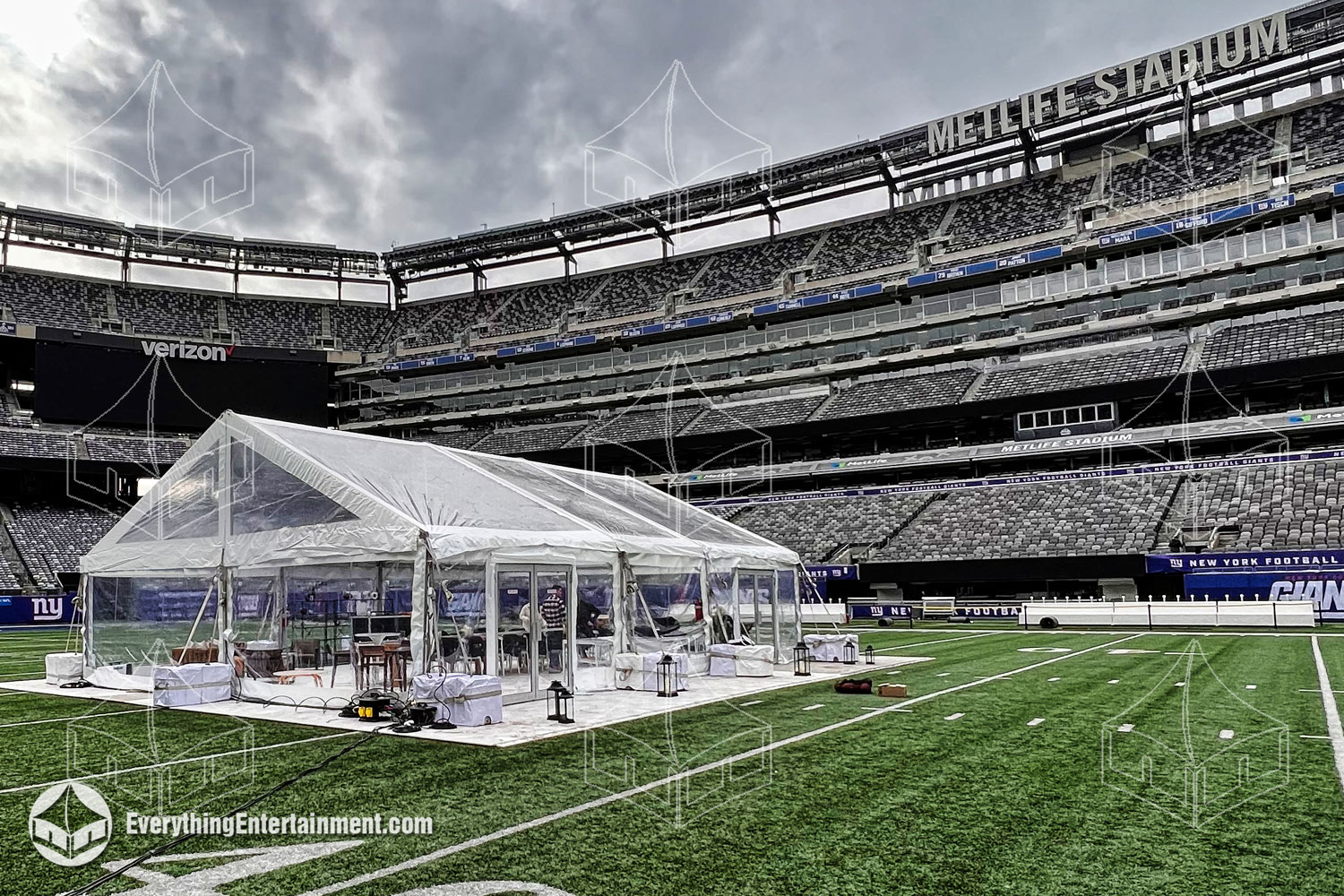 Clear top frame tent on field in stadium