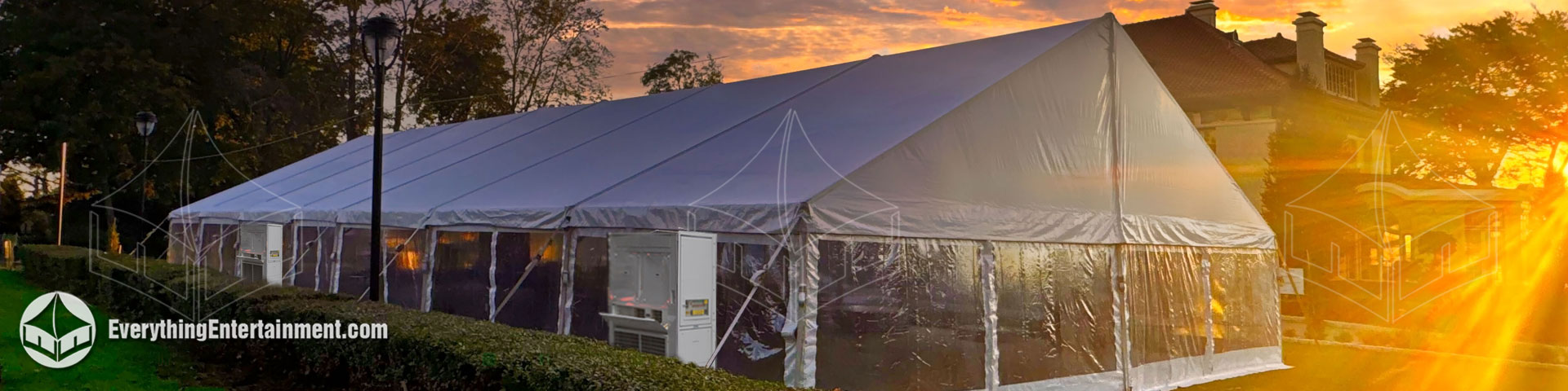 40x100 frame tent with sidewalls installed on grass in Staten Island, fully enclosed for summer climate control.
