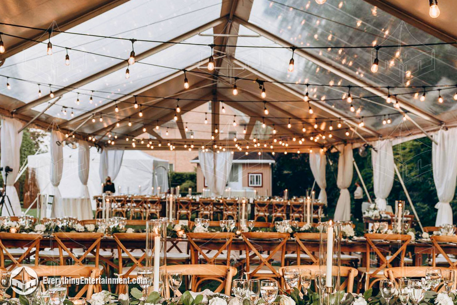 clear top tent with chairs setup for ceremony