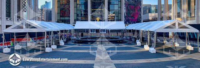 Multiple frame tents setup around the fountain at Lincon Center in New York City