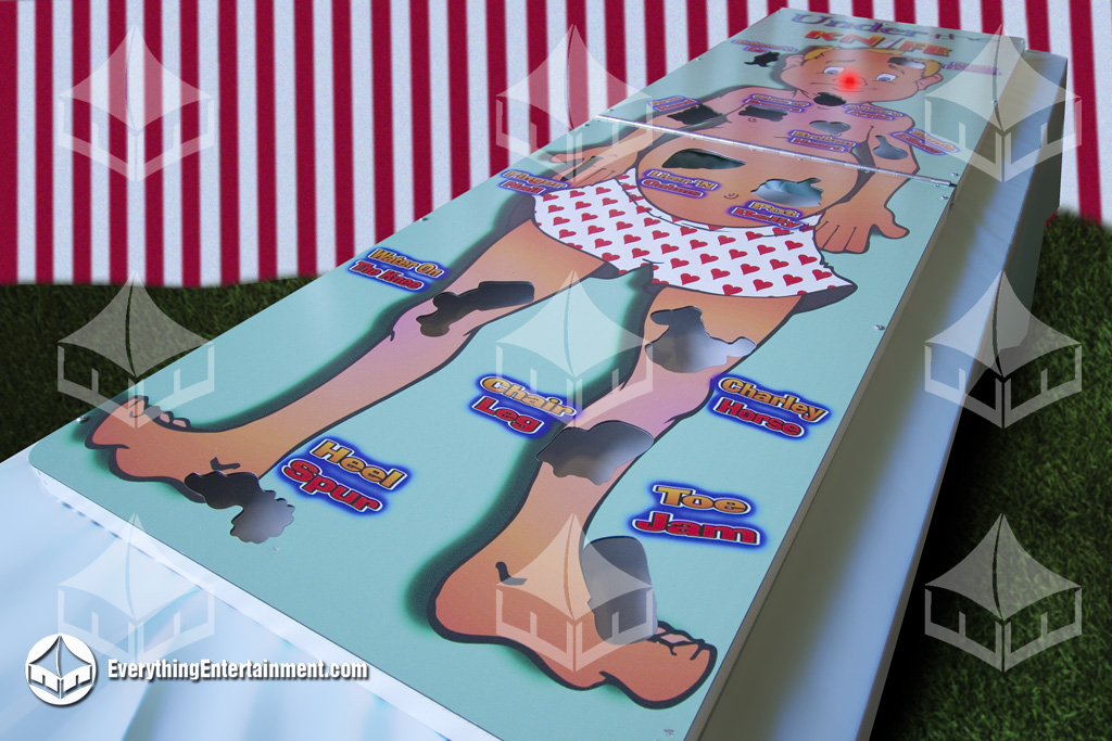 surgery game surgery game on table, inside a red and white carnival booth