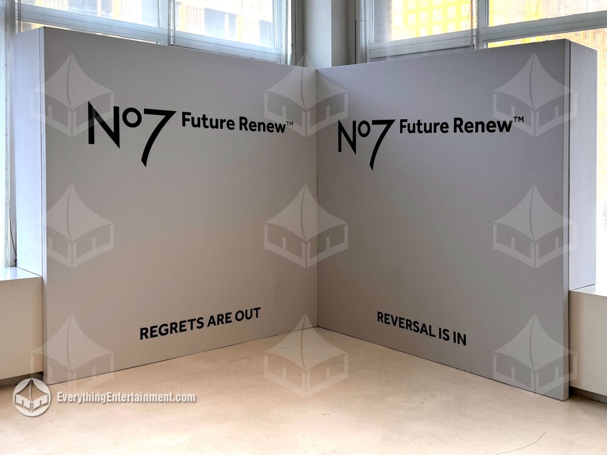 Custom white L-shaped theatrical wall build with No7 Future Renew branding installed for a corporate promotion in NYC by Everything Entertainment.