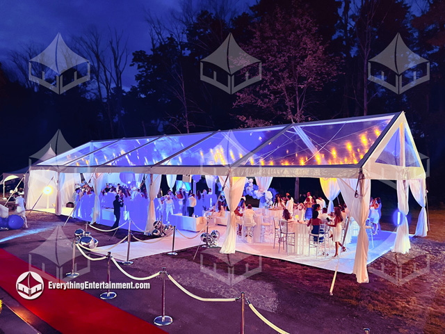 30x75 clear top tent with colorful lights in Colts Neck, NJ for party.