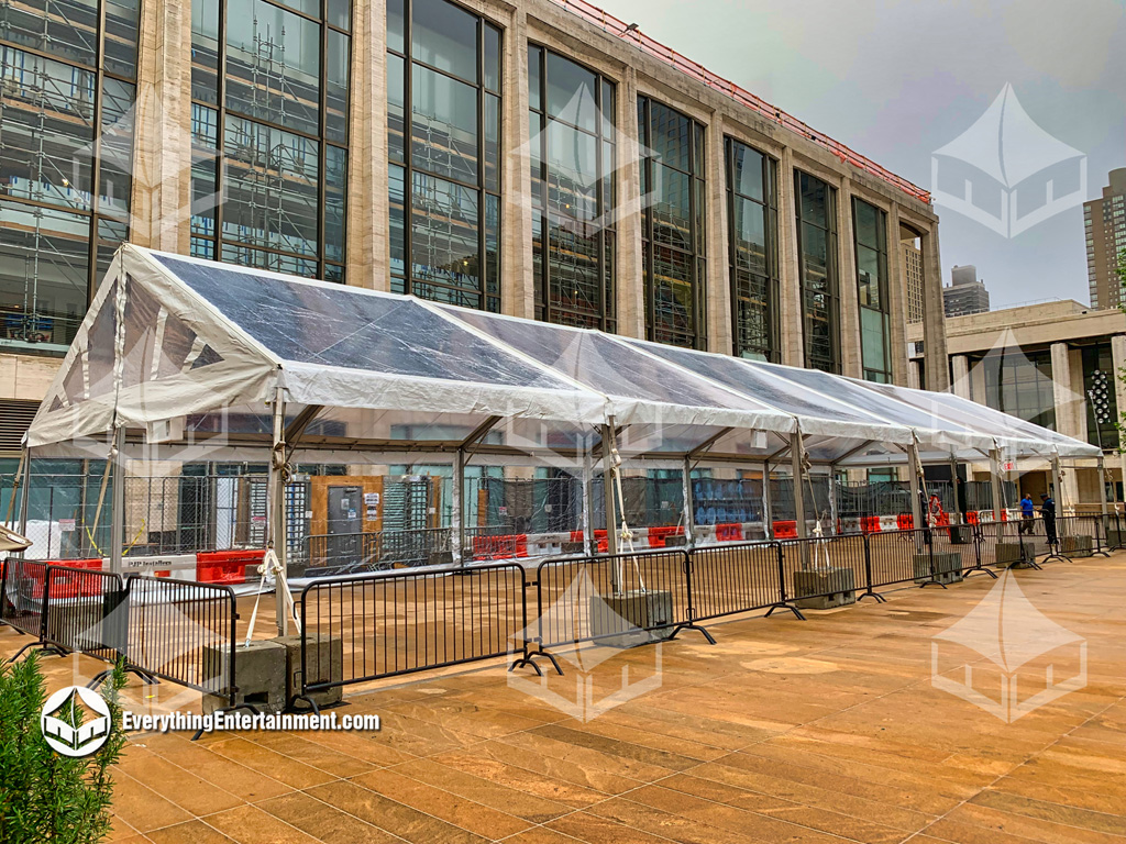 30x90 clear top tent at Lincoln Center, setup with cement tent ballast.
