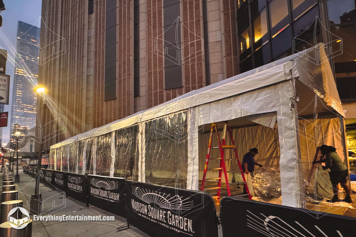 Long white tent with clear sidewalls at Madison Square Garden in New York City