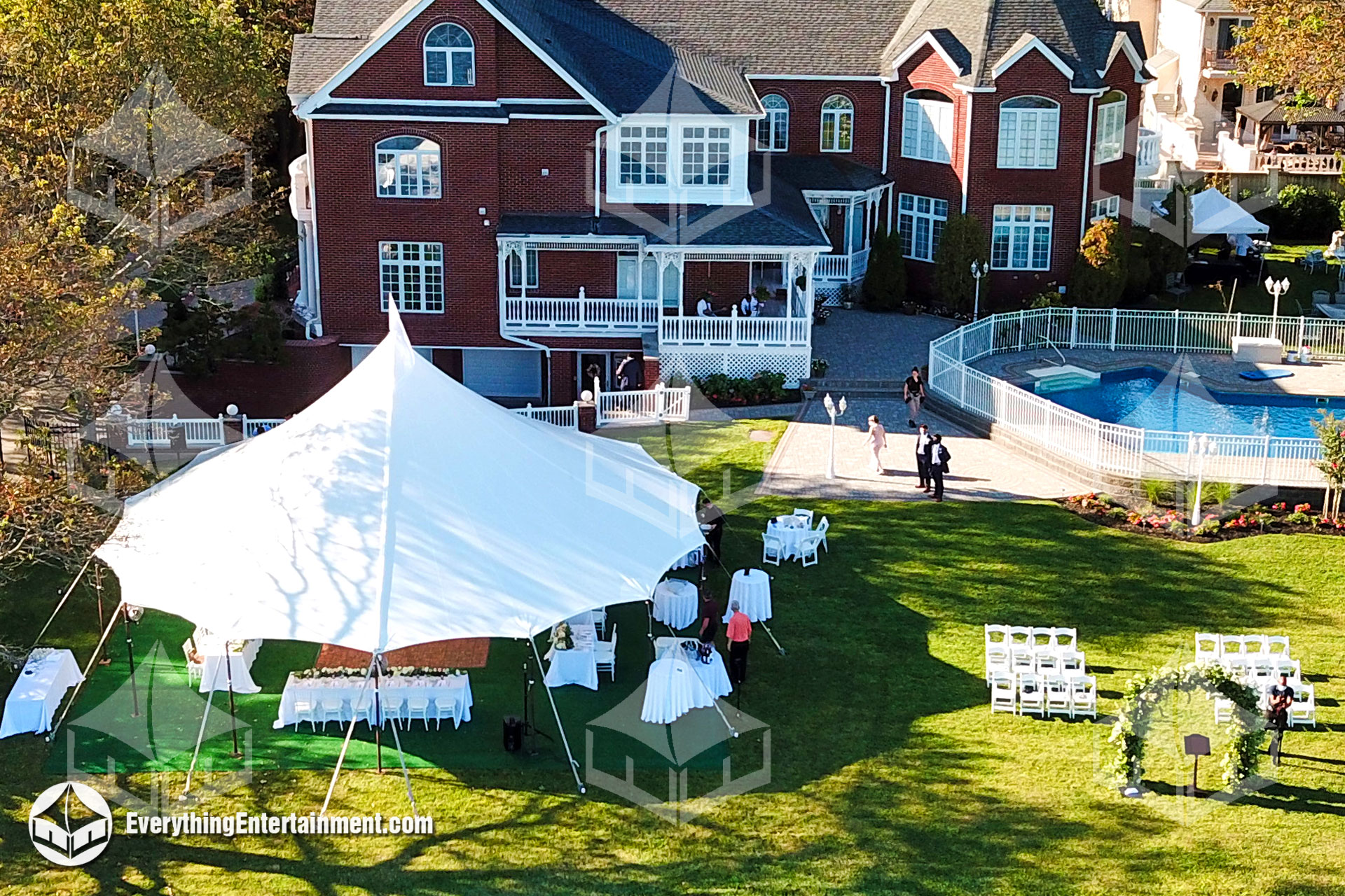 sail cloth tent setup for backyard wedding