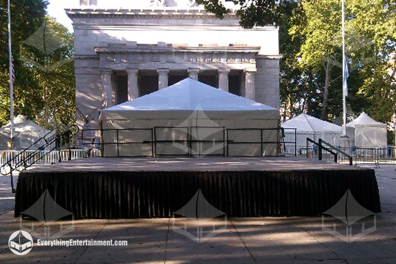 20x24 foot stage Portable stage with black railing and skirts setup in front of General Grants National Memorial