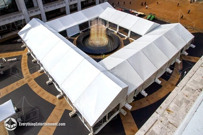 Four very large tents surrounding the fountain at Lincoln Center, NYC