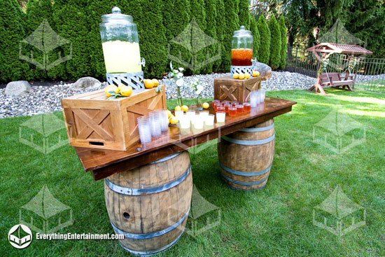 Two wine barrel rentals with wooden bar top